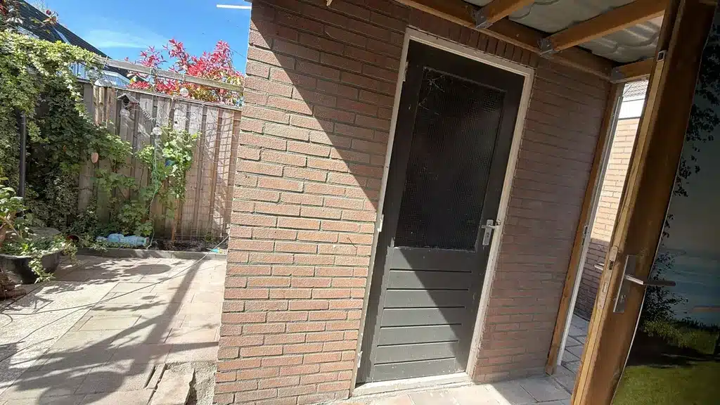 Gevelrenovatie twee woningen en schuren Zoetermeer