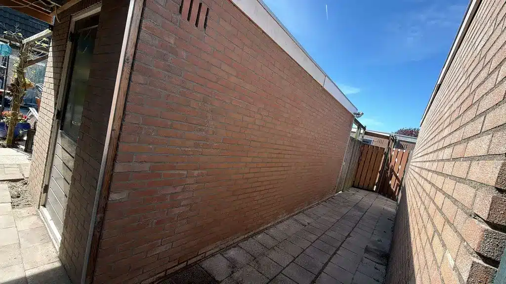 Gevelrenovatie twee woningen en schuren Zoetermeer